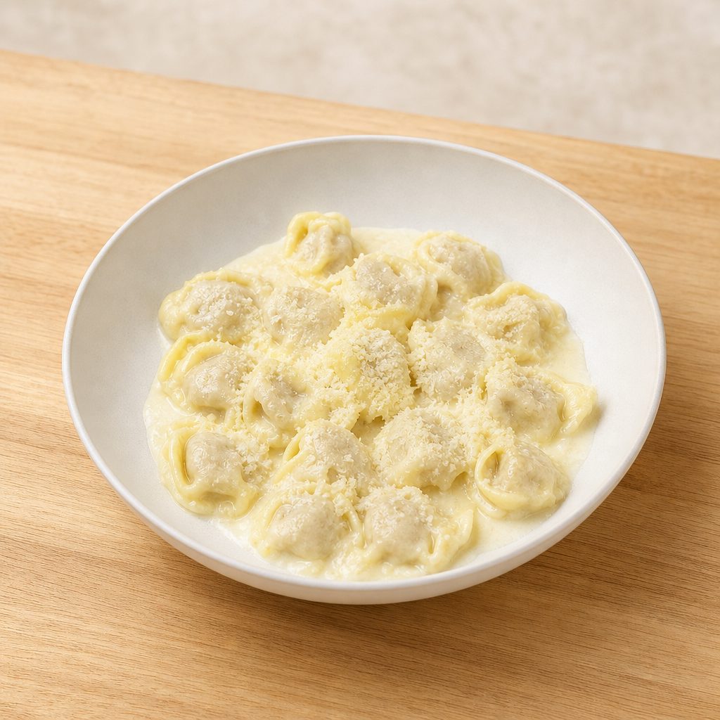 Chicken Ravioli Crema Parmigiano.
