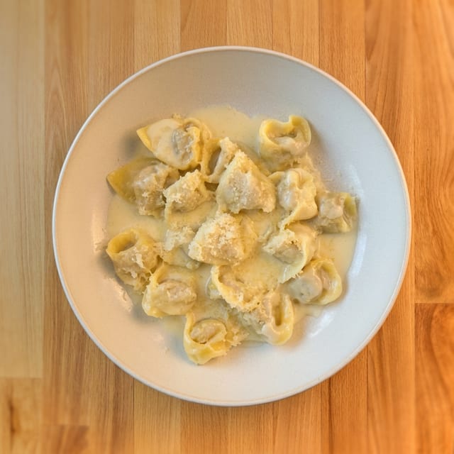Chicken Ravioli Crema Parmigiano.